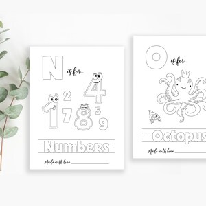 May include: Black and white printable coloring page featuring the letter N and the word "Numbers" with a cartoon illustration of the numbers 1, 2, 4, 5, 7, 8, and 9. The letter O and the word "Octopus" are also featured with a cartoon illustration of an octopus.