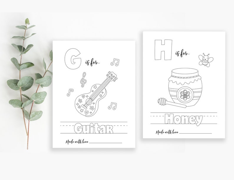 May include: Black and white printable coloring page featuring the letter G and a guitar with the text "G is for... Guitar". The page also includes musical notes and the text "Made with love".