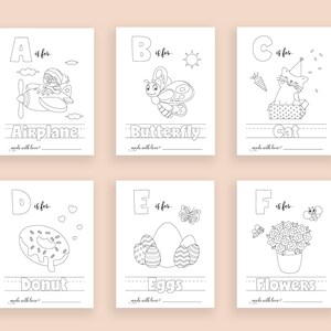 May include: Black and white printable alphabet flashcards for kids featuring illustrations of an airplane, butterfly, cat, donut, eggs, and flowers. Each card has a letter, the word for the image, and the phrase "made with love".