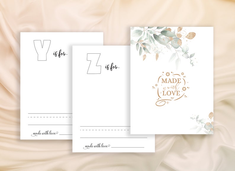 May include: Two blank printable alphabet cards with the letters Y and Z, with the text "is for..." next to each letter. The cards have a dotted line for writing and the text "made with love?" at the bottom. A third card has a watercolor background with green leaves and gold glitter, and the text "MADE with LOVE" in gold.