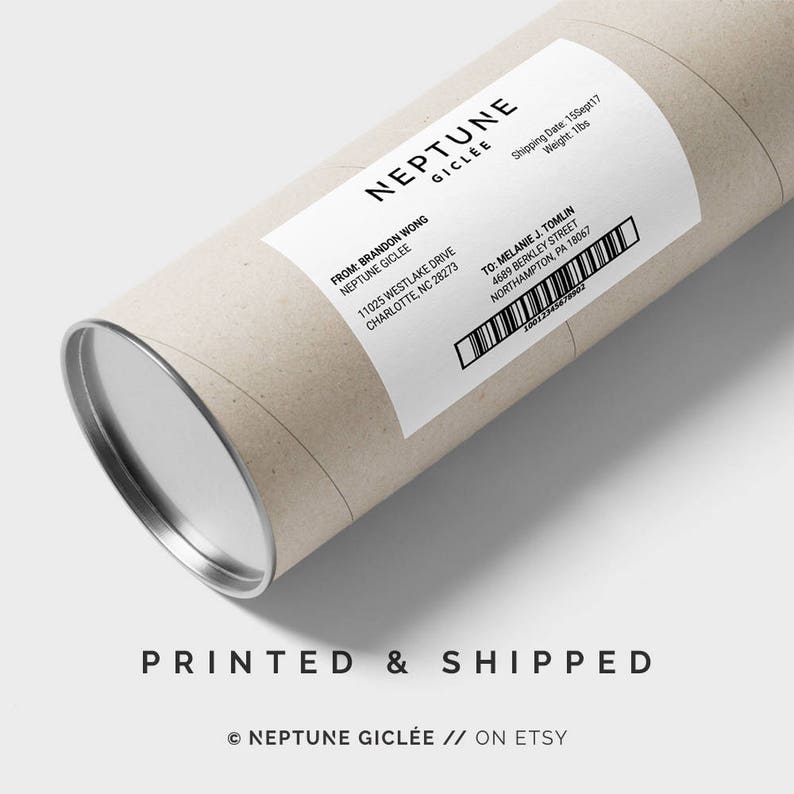 May include: A brown cardboard tube with a silver end cap. A white label is attached to the tube with the text "NEPTUNE GICLEE" and shipping information. The text "PRINTED & SHIPPED" is printed on the tube below the label. The text "&copy; NEPTUNE GICLEE // ON ETSY" is printed below the text "PRINTED & SHIPPED".