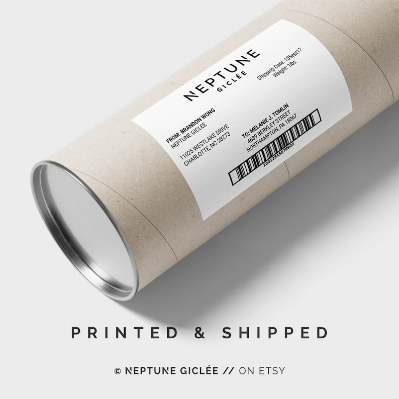 May include: A brown cardboard tube with a silver end cap. A white label is attached to the tube with the text "NEPTUNE GICLEE" and shipping information. The text "PRINTED & SHIPPED" is printed on the tube below the label. The text "&copy; NEPTUNE GICLEE // ON ETSY" is printed below the text "PRINTED & SHIPPED".