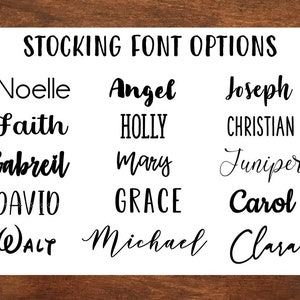 May include: A white sheet of paper with the text "STOCKING FONT OPTIONS" at the top.  The paper lists a variety of names in different fonts, including Noelle, Angel, Joseph, Faith, Holly, Christian, Gabreil, Mary, Juniper, David, Grace, Carol, Walt, Michael, and Clara.