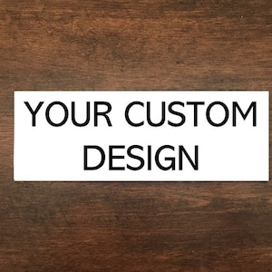 May include: White rectangular sign with black text that reads "YOUR CUSTOM DESIGN".