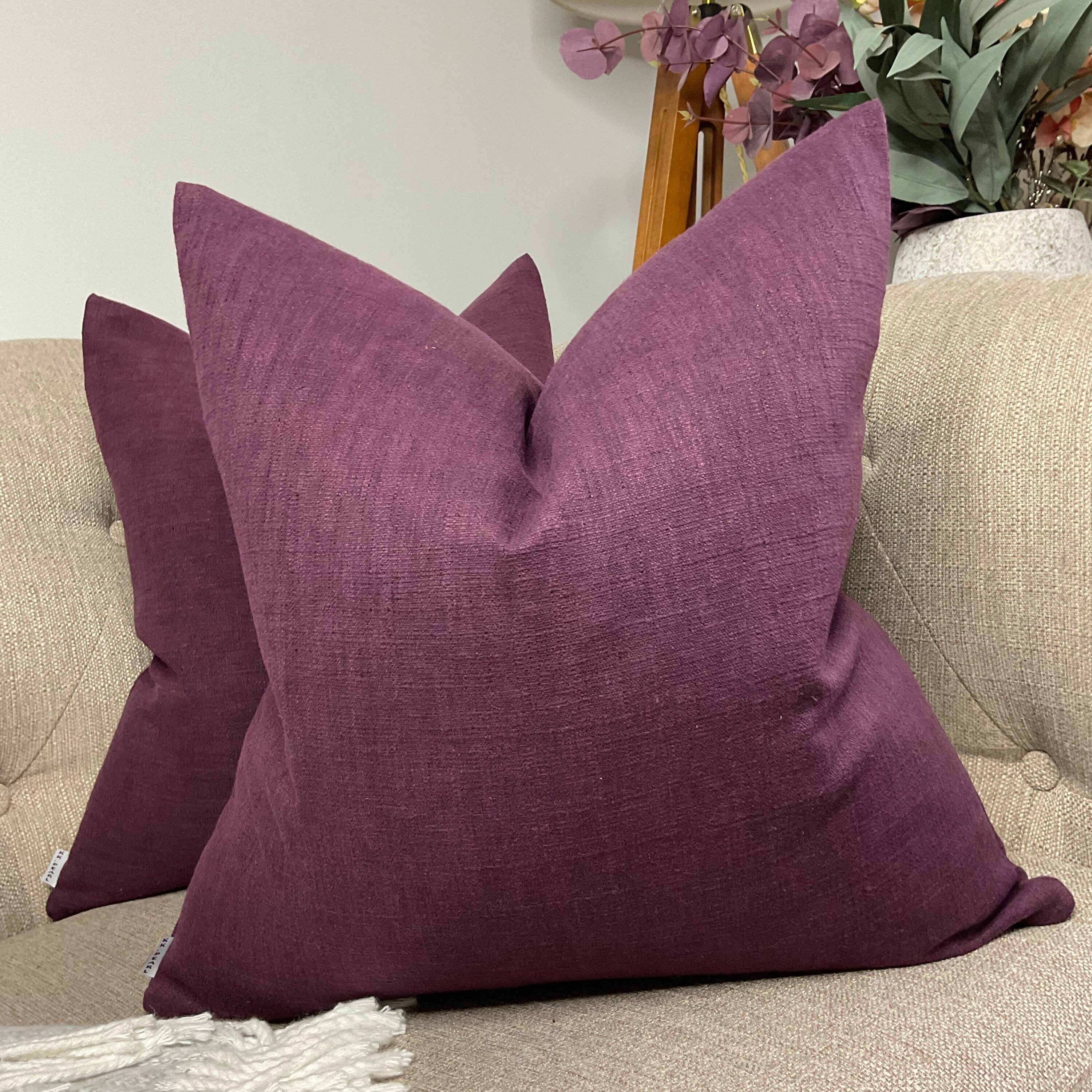 Plum top couch pillows