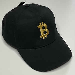 May include: A black baseball cap with a gold embroidered Bitcoin symbol.