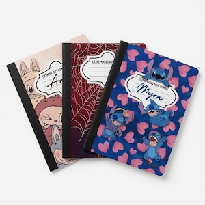 May include: Three composition notebooks with black spines. The left features cartoon characters and hearts. The center has a dark red spiderweb pattern. The right is blue with pink hearts and the cartoon character Stitch, with the text COMPOSITION BOOK Myra.