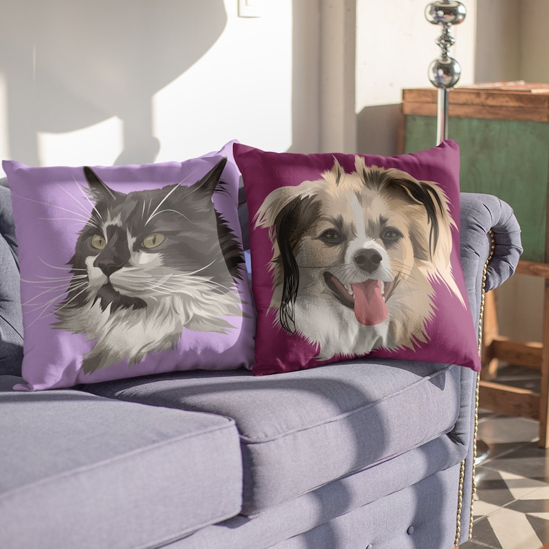 May include: Two decorative throw pillows with custom pet portraits. The pillow on the left features a black and white cat with green eyes on a light purple background. The pillow on the right features a brown and white dog with a pink tongue sticking out on a burgundy background.