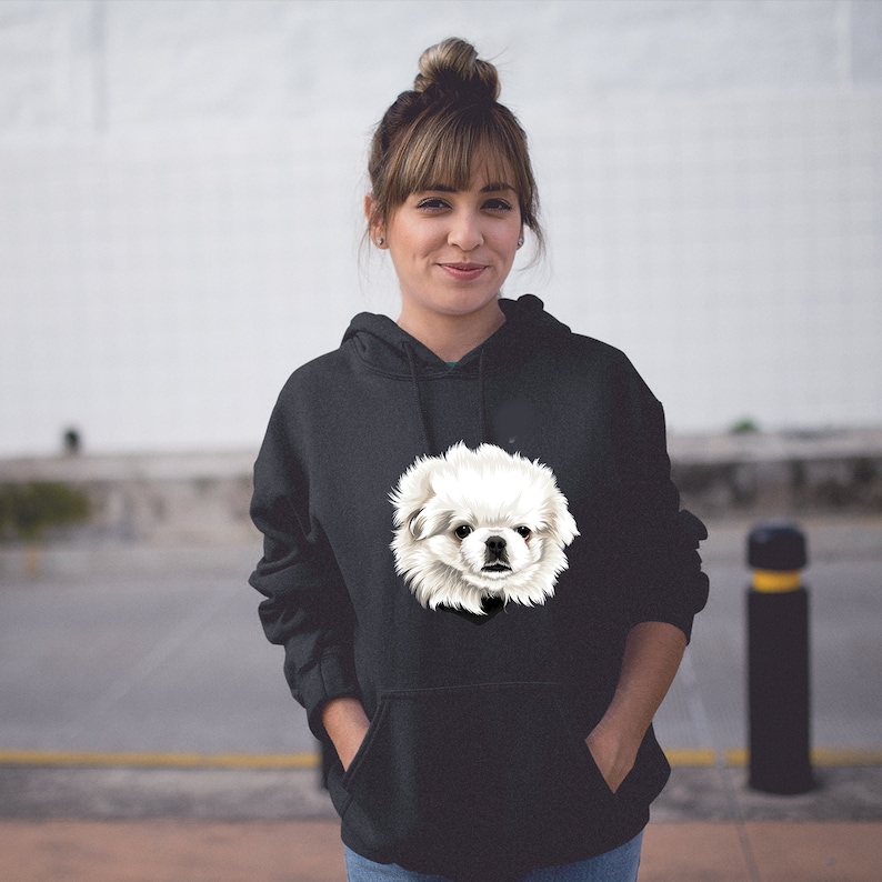 May include: A black hoodie with a white Pekingese dog illustration on the front.