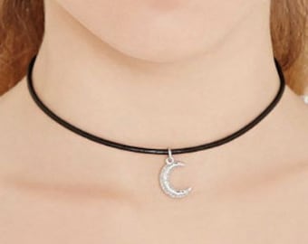 Black faux leather choker with silver crescent moon design