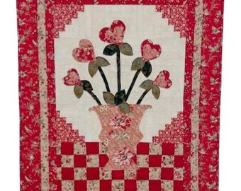 ハートと花が付いた壁掛け用プレカットキット。裏地とスリーブ付き。