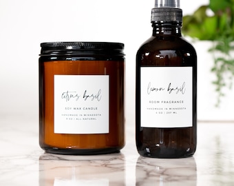May include: A soy wax candle and room fragrance set in amber glass bottles with black lids and sprayers. The candle label reads "citrus basil", and the room fragrance reads "lemon basil". Both are handmade in Minnesota, USA.