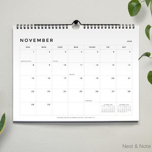 May include: A set of three ceramic mugs with a speckled, matte finish. The mugs are in shades of cream, light gray, and dark gray. Each mug has a simple, minimalist design, perfect for coffee or tea.