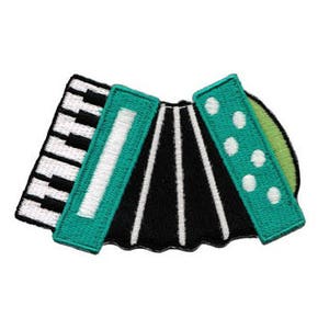 Peut inclure: Patch brodé vert et noir d'un accordéon avec des touches blanches et des pois blancs.
