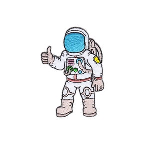 Könnte beinhalten: Ein gestickter Aufnäher mit einem Astronauten, der den Daumen nach oben zeigt. Der Astronaut trägt einen weißen Raumanzug mit einem blauen Visier und einem gelben Aufnäher auf der Schulter.