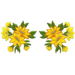 May include: Two yellow embroidered flower patches with green leaves. The flowers have a yellow centre and yellow petals with orange outlines.