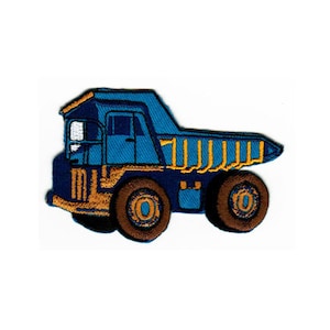 May include: A blue toy dumper truck with a yellow body and large brown wheels.
