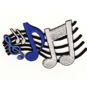 Peut inclure: Un patch brodé représentant une note de musique bleue avec une clé de sol et deux notes de musique blanches sur un fond rayé noir et blanc.