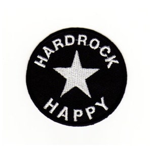 May include: Black and white embroidered patch with a white star and the text "Hardrock Happy" in a circle.