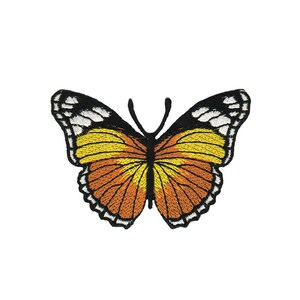 May include: Embroidered iron-on patch of a yellow and orange butterfly with black outlines.