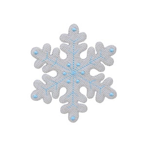 May include: A white snowflake ornament with blue embroidery. The snowflake has a six-pointed star shape with intricate details.