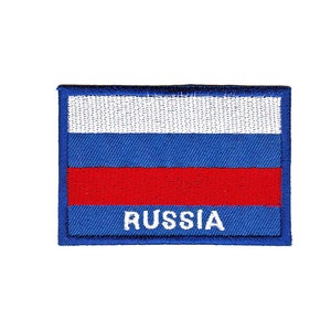Puede incluir: Un parche bordado con la bandera rusa en azul, blanco y rojo con la palabra "RUSSIA" en letras blancas.