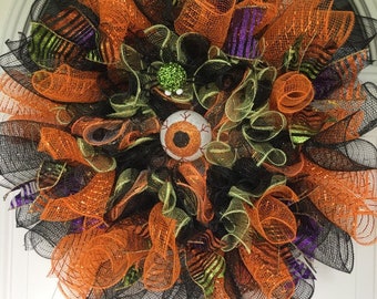 Creepy eyeball halloween mesh orange black and green wreath