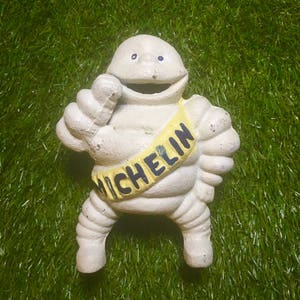 large cast iron michelin man figurine