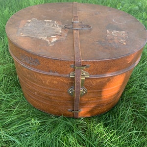 Vintage large tin oval drapery storage box