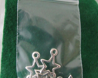 Mixed Silver Tone Star Charms – 7 Pieces