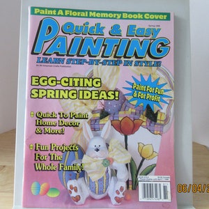 May include: Magazine cover for Quick & Easy Painting, a publication for learning step-by-step painting techniques. The cover features a painted Easter bunny holding a basket of eggs and flowers. The text "Egg-Citing Spring Ideas!" is featured in a large font.