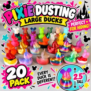 May include: A collection of twenty small plastic duck figurines, each featuring mouse-like ears. The ducks are rendered in various solid, metallic, and rainbow colors. A circular inset shows one duck measuring 2.5 inches tall. Text includes PIXIE DUSTING LARGE DUCKS.