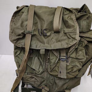 May include: A set of three ceramic mugs with a speckled, matte finish. The mugs are in shades of cream, light gray, and dark gray. Each mug has a simple, modern design and a rounded handle. Perfect for coffee or tea.