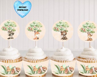 May include: Cupcakes with woodland animal toppers and matching cupcake wrappers. The toppers feature a raccoon, fox, bear, and deer under a tree. The wrappers have a butterfly and mushroom design. The text "INSTANT DOWNLOAD!" is in a blue heart.