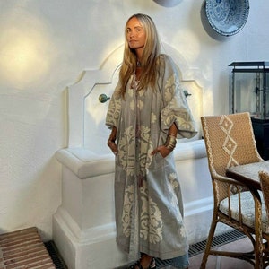 Ukrainian linen dress with embroidered applique Fashion iconic linen vyshyvanka