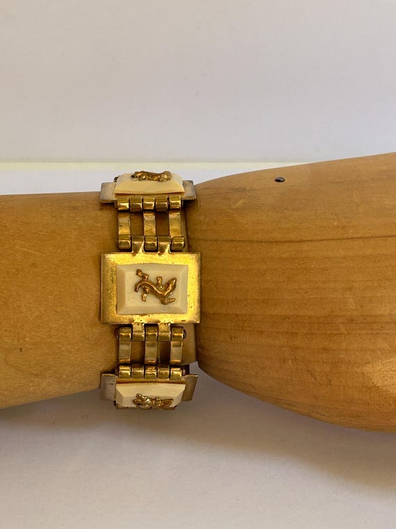 Jean Painlevé gold salamander bracelet and beige bakelite Art Deco design from the 40s