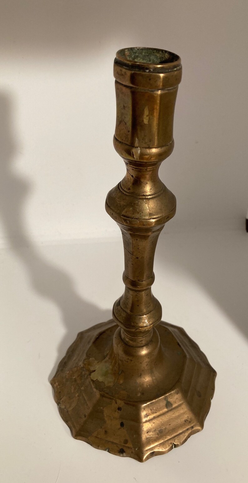 Former High Period bronze candlestick