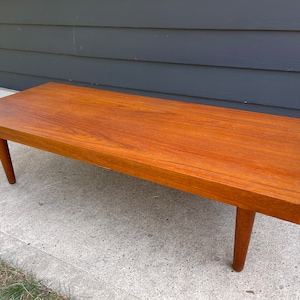 Mid Century Teak Veneer Slab Coffee Table Raised On Thick Solid Teak Peg Legs