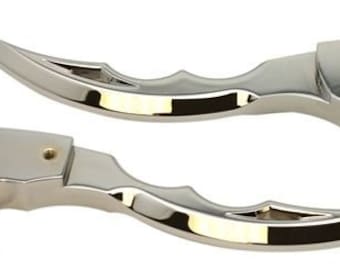 May include: A pair of chrome motorcycle levers with a unique, sharp, and angular design. The levers have a pointed, claw-like shape.