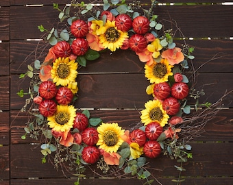 Fall wreath with sunflowers, pumpkins, and floral