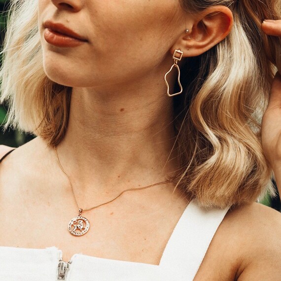 Gold plated hotsell zodiac necklace