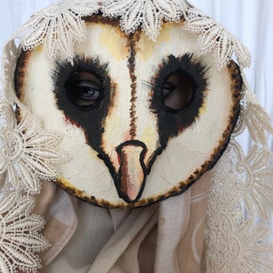 Hand made, hand painted owl masks, with black rimmed eye holes and delicate beaks. These masks are great for Halloween, costume and masquerade parties, photo and video props, and fun times.