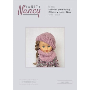 May include: A pink knitted hat and scarf set for a doll. The set is made with a simple stitch pattern and is labelled "Vanity Nancy N° 0035 Patrones para Nancy Clásica y Nancy New GORRO Y CUELLO PUNTO DE DOS AGUJAS NIVEL: FÁCIL"