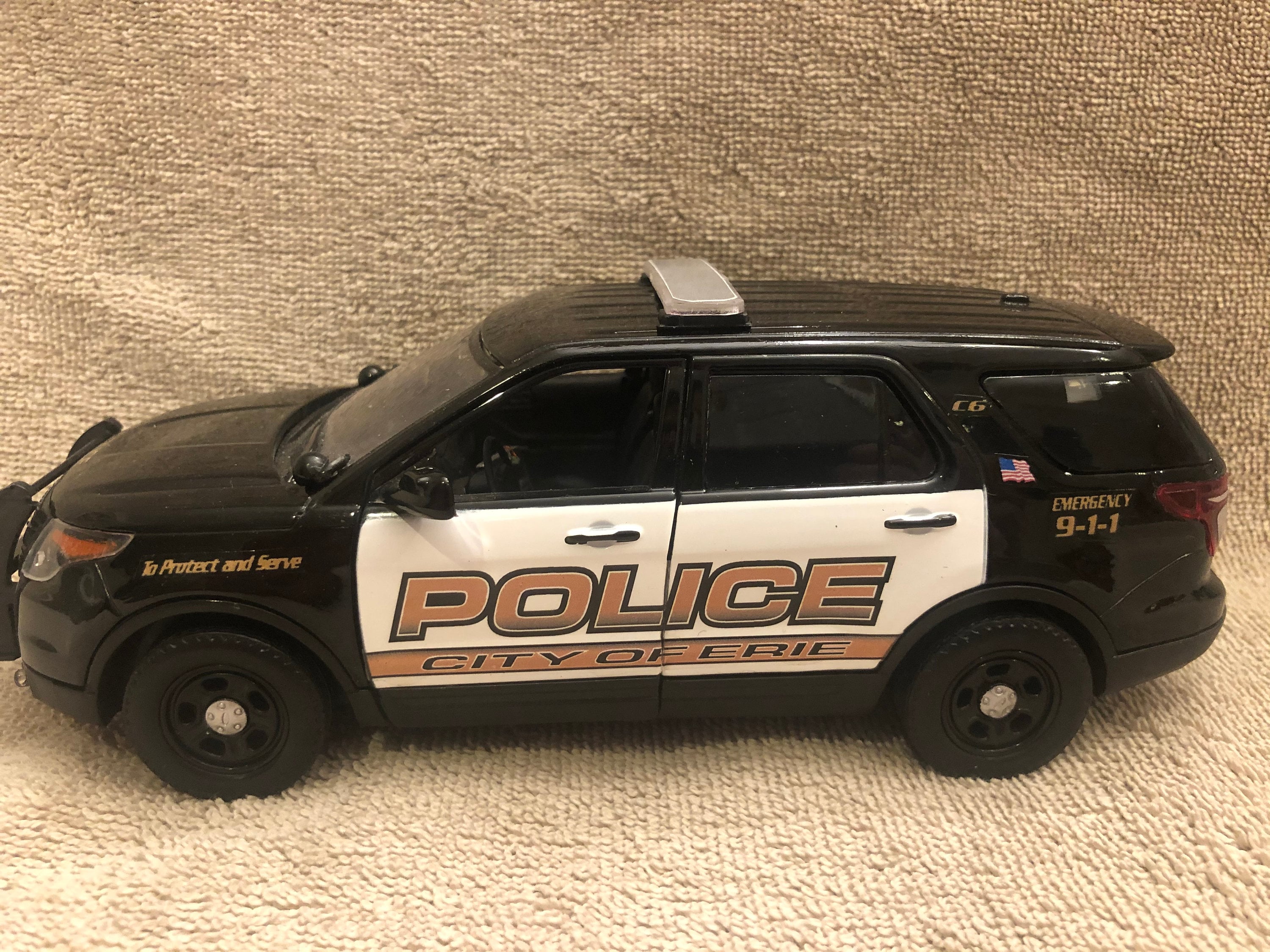 Ford explorer police car hot sale toy