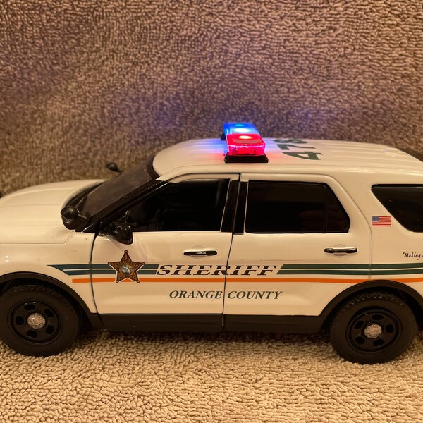 1/24 Scale Orange County Florida Sheriffs  Dept die cast model car  Ford Explorer with factory installed lights and siren