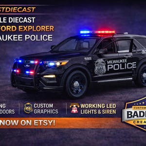 May include: A 1/24 scale diecast model of a 2022 Ford Explorer Milwaukee Police vehicle. The black SUV features working LED lights and siren, custom graphics, and opening front doors. The text "ORDER NOW ON ETSY!" is displayed.
