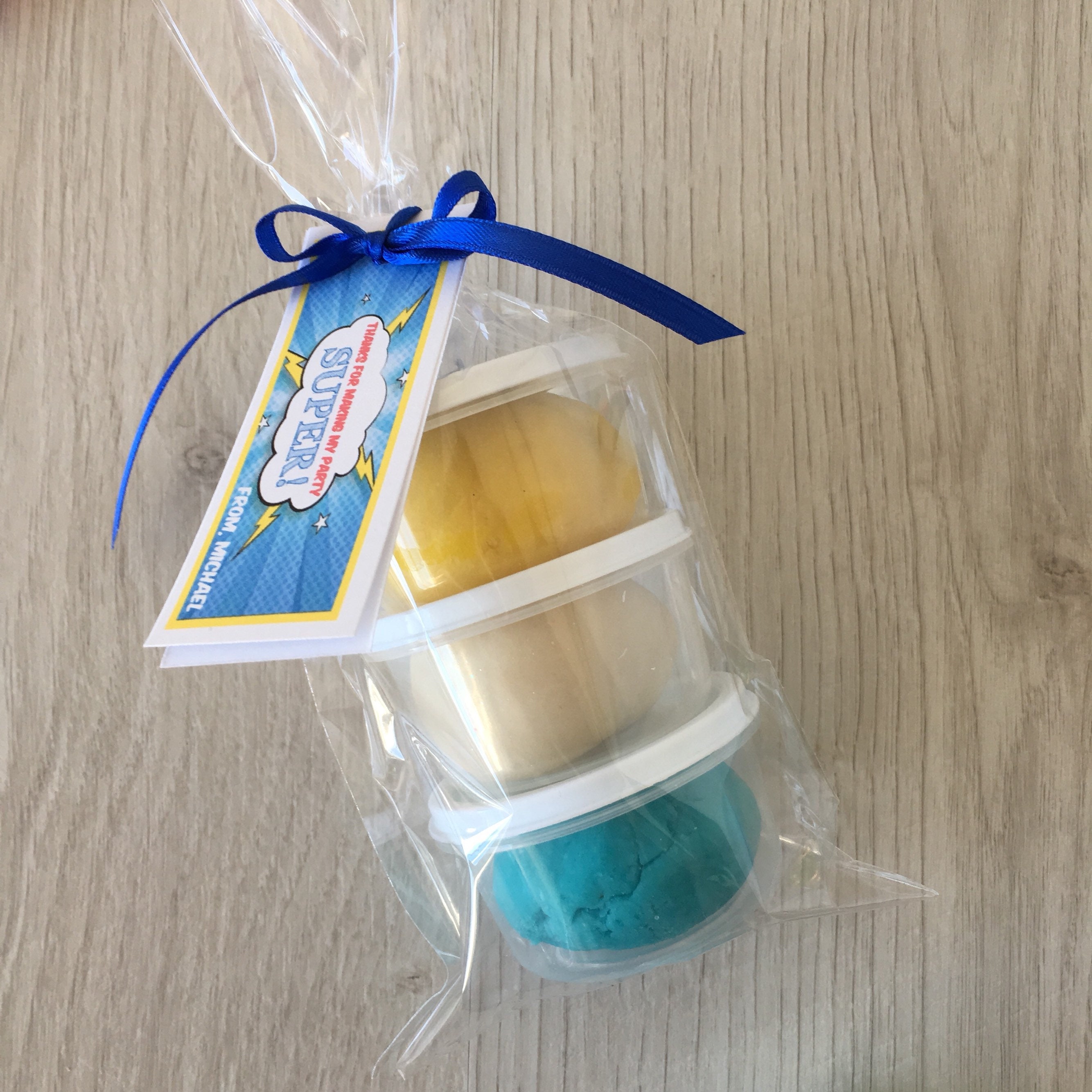 Superhero Play Dough Party Favors includes homemade playdough in