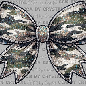 May include: A large decorative bow with a camouflage pattern in shades of green, black, and tan. The bow is outlined in black and embellished with sparkling glitter and a silver-colored trim. The bow's center is also adorned with glitter.