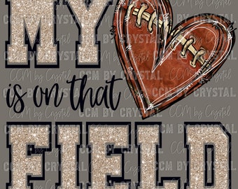 May include: A glittery gold graphic that says "MY is on that FIELD" with a brown football-shaped heart in the middle.