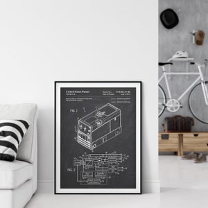 May include: A framed patent print depicting an engine-driven welder generator with a chopper circuit. The print features diagrams labeled FIG. 1 and FIG. 2, with technical schematics and text. The patent number is US 8,502,115 B2.